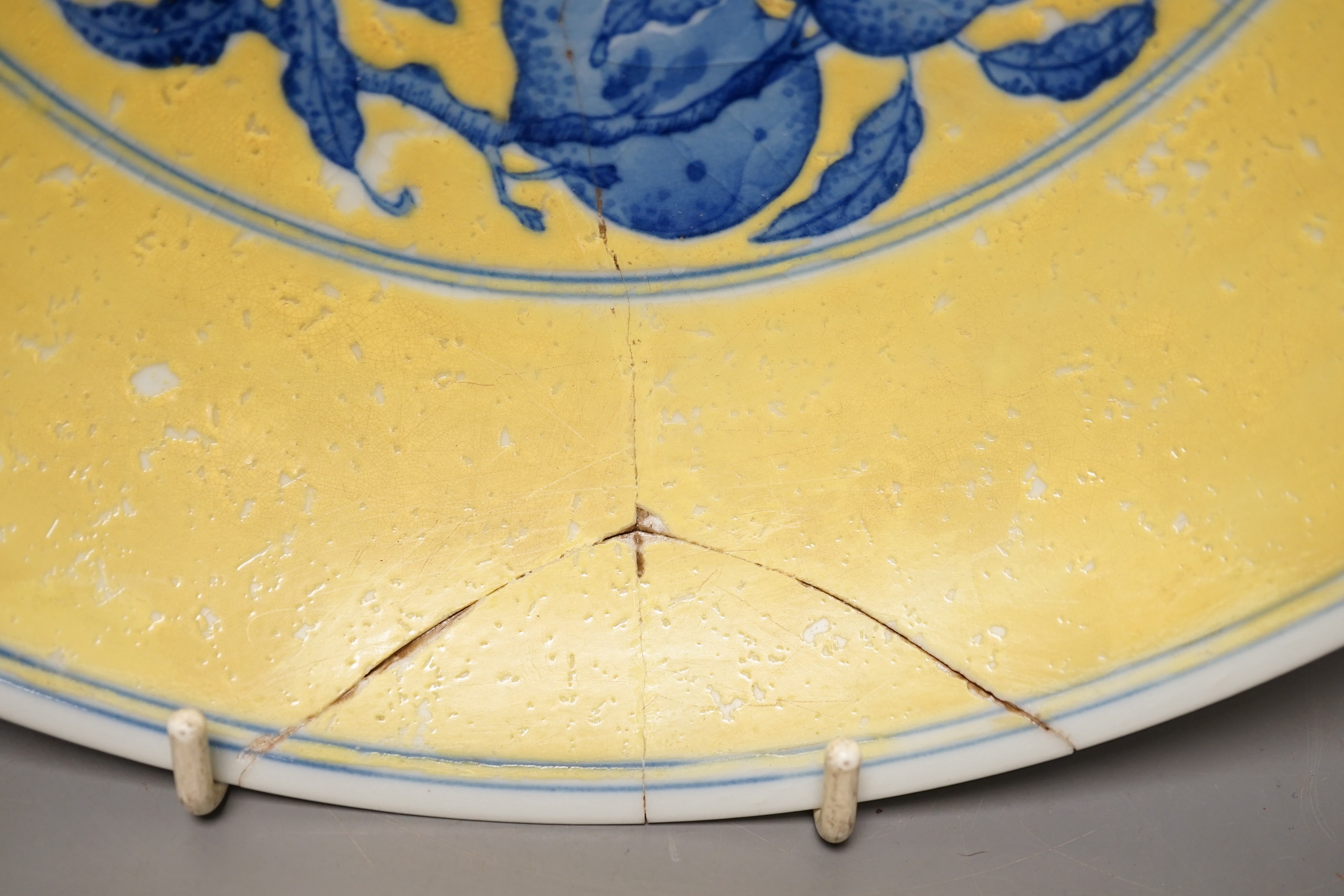 A Chinese yellow ground dish a/f. 28cm